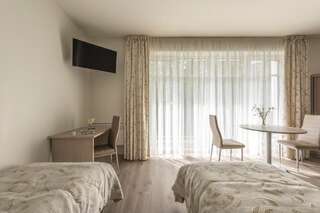 Отель ORO Nida Нида Апартаменты с 2 односпальными кроватями-1